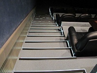 Укладка ковролина и монтаж кресел Времена года Кинотеатр