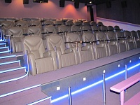 Укладка ковролина и монтаж кресел Времена года Кинотеатр