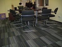 Укладка ковровой плитки Интраст Тур Офис компании