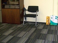 Укладка ковровой плитки Интраст Тур Офис компании